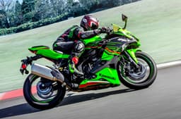 Kawasaki Ninja ZX4RR right side profile riding image on track